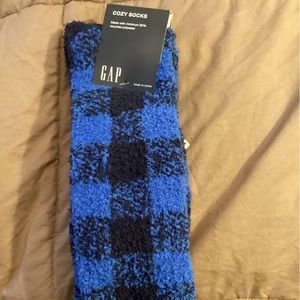Brand new, fuzzy, nonslip Gap socks.